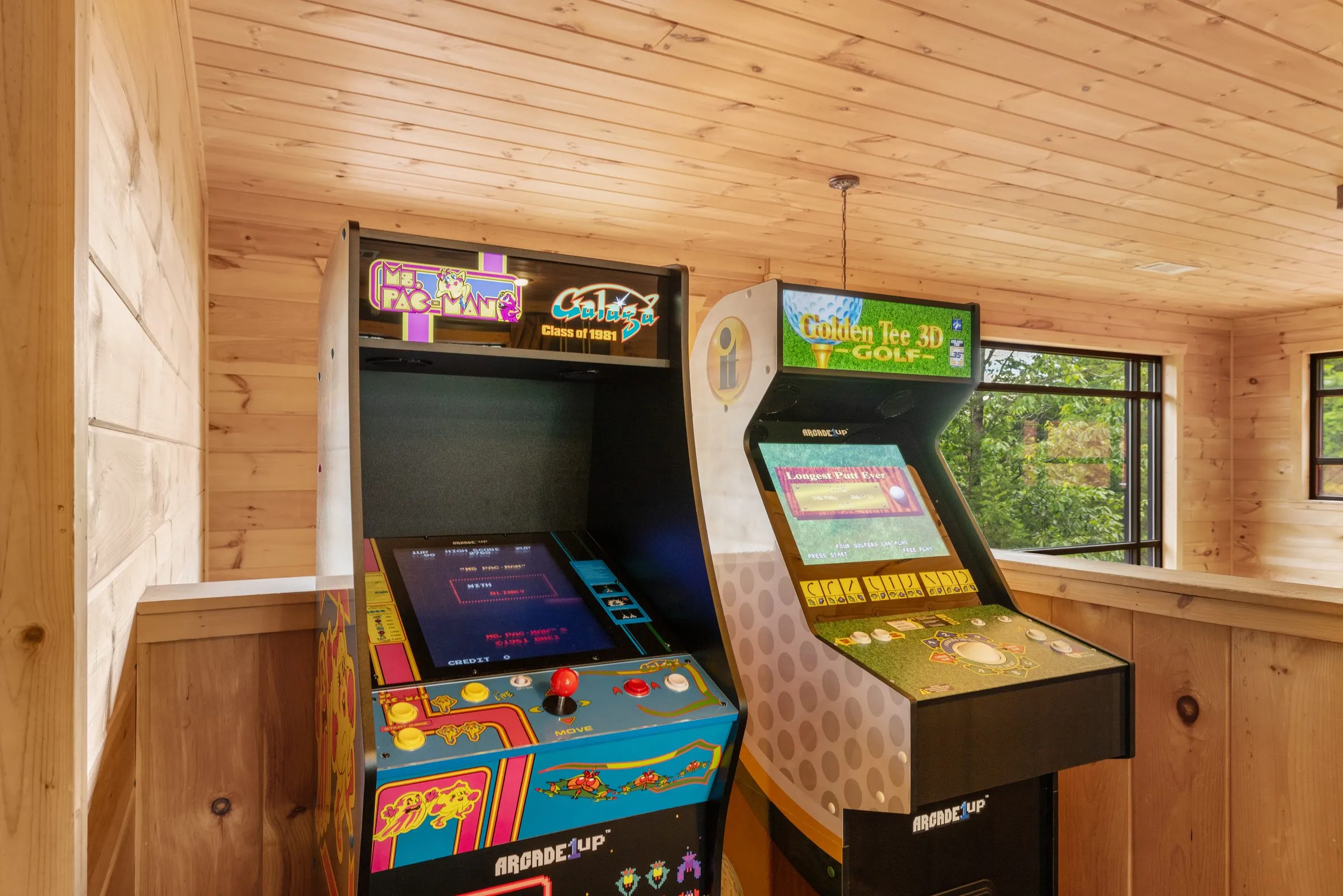 Classic Ms. Pac-Man and Golden Tee arcade cabinets